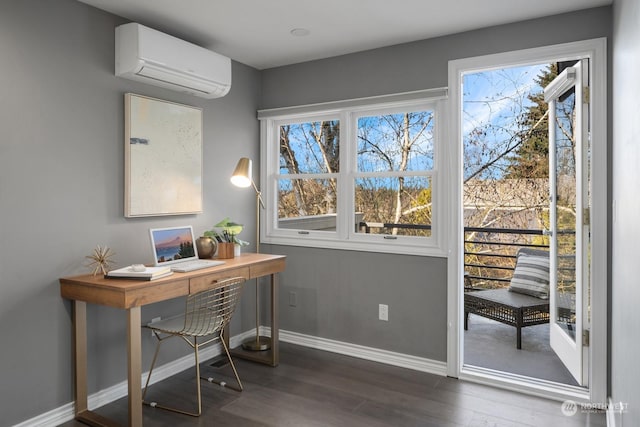 office featuring dark hardwood / wood-style flooring and an AC wall unit