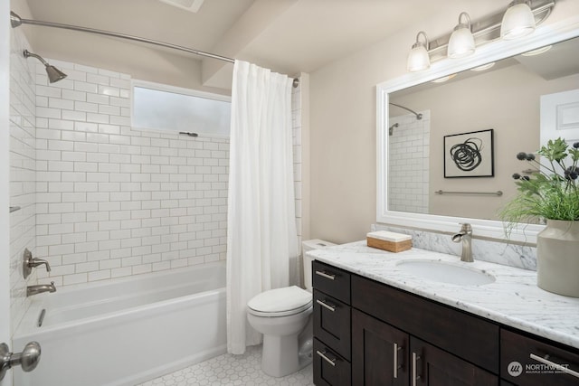 full bathroom with vanity, toilet, and shower / bath combo