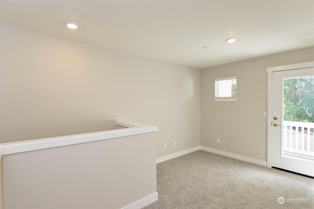 view of carpeted spare room