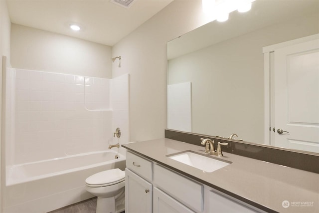 full bathroom featuring shower / tub combination, vanity, and toilet