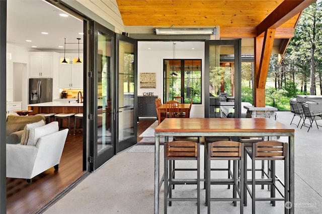 sunroom featuring french doors