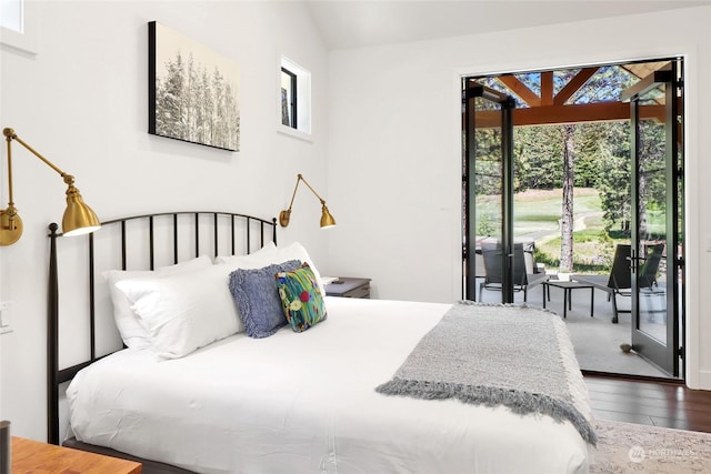 bedroom with hardwood / wood-style flooring