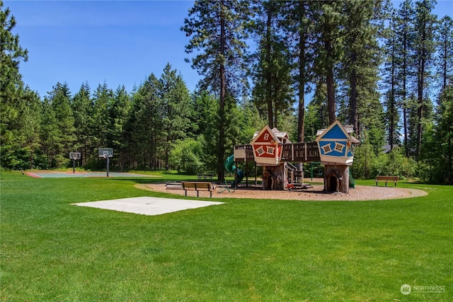 surrounding community featuring a lawn and a playground