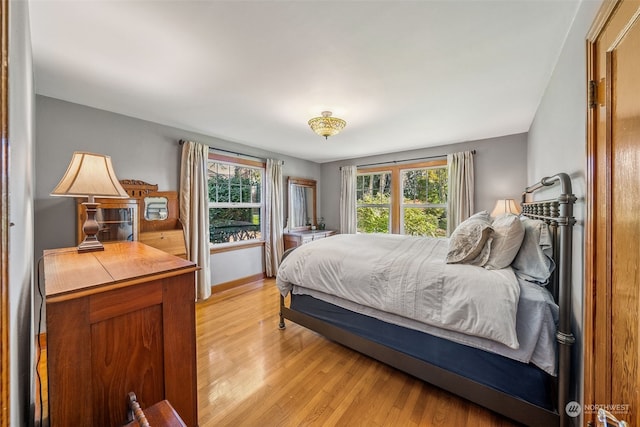 bedroom featuring light hardwood / wood-style floors