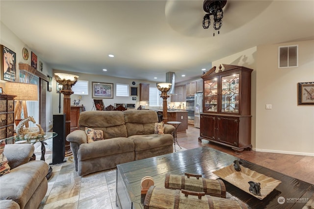 living room featuring ceiling fan