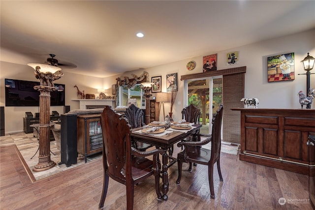 dining area featuring hardwood / wood-style flooring