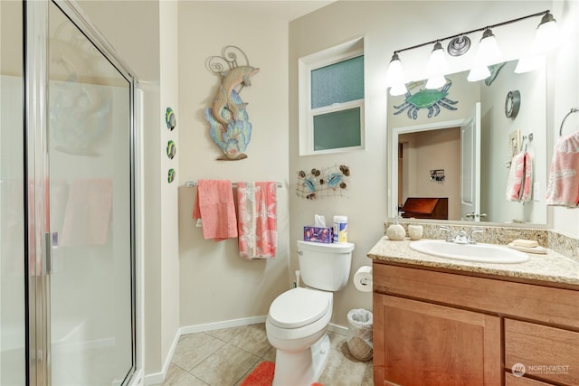 bathroom with vanity, toilet, an enclosed shower, and tile patterned flooring