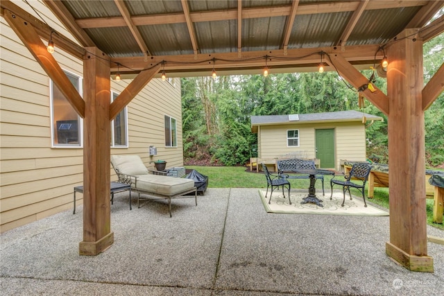 view of patio / terrace with an outdoor structure