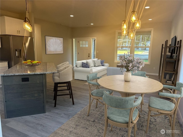 dining area with light wood-type flooring