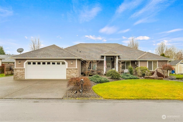 view of front facade with a garage and a front yard