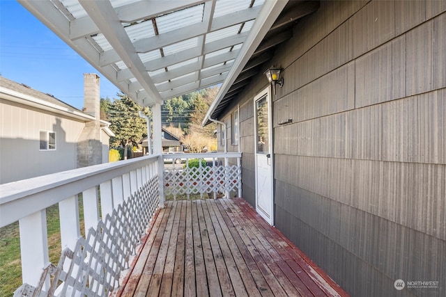 wooden terrace with a pergola