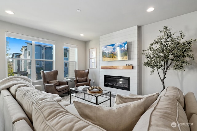 living room featuring a fireplace