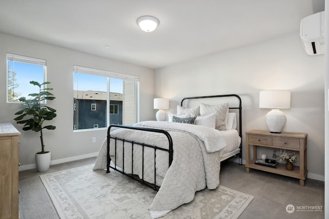 bedroom with light colored carpet and a wall mounted air conditioner