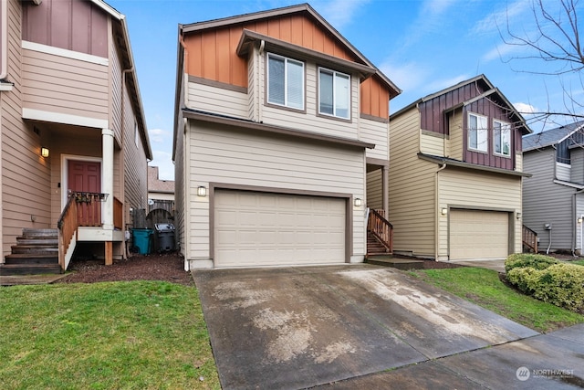 view of front of property featuring a garage and a front yard