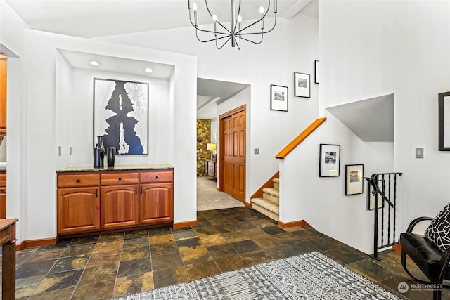 entryway featuring a chandelier