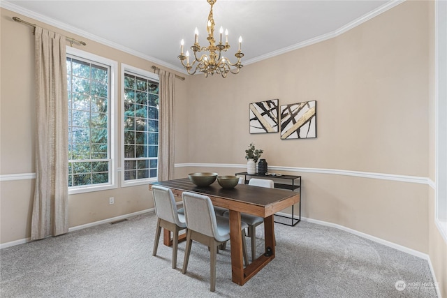 dining room featuring ornamental molding, plenty of natural light, light colored carpet, and an inviting chandelier