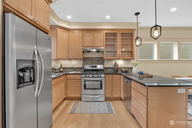 kitchen featuring crown molding, light hardwood / wood-style flooring, stainless steel appliances, decorative light fixtures, and light brown cabinets