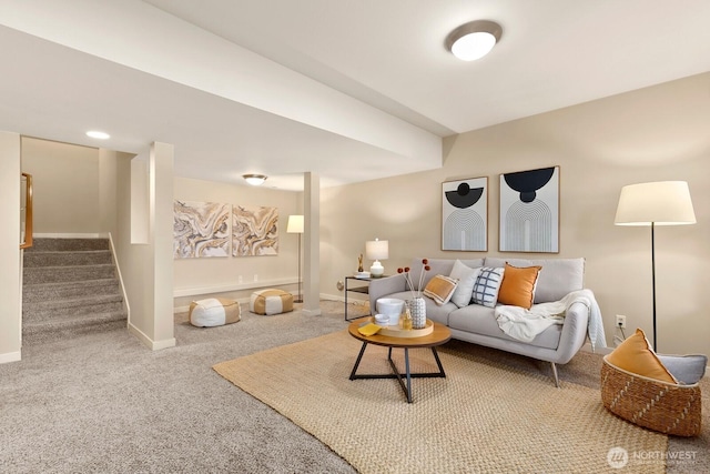 living room with stairway, baseboards, and carpet