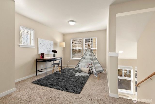 game room featuring baseboards and carpet floors