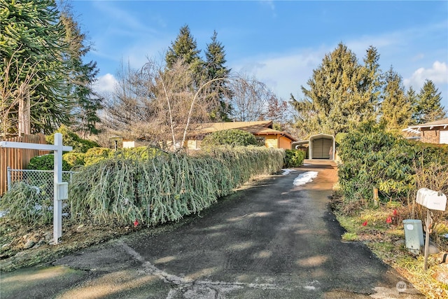 exterior space with a carport