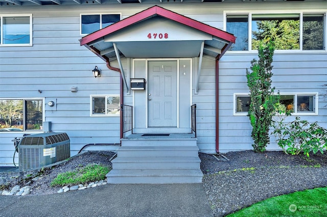 property entrance featuring central air condition unit