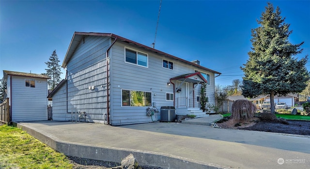 view of front of home featuring central air condition unit