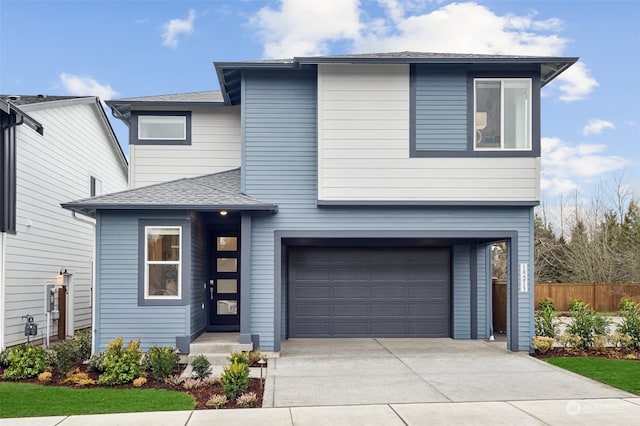 view of front of home with a garage