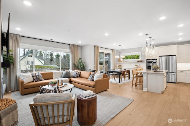 living room with light hardwood / wood-style flooring