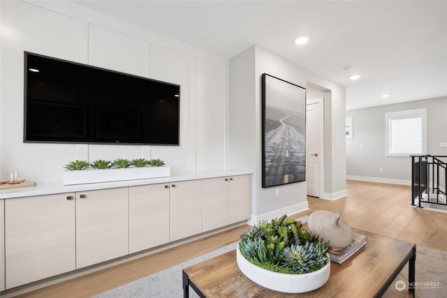 living room with light hardwood / wood-style floors