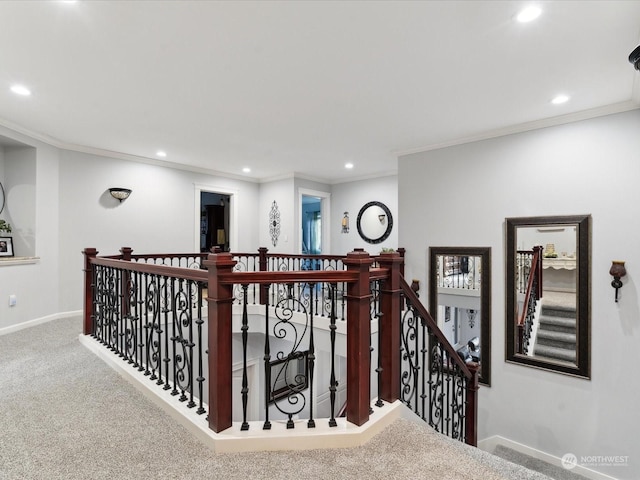 staircase with ornamental molding, carpet, baseboards, and recessed lighting