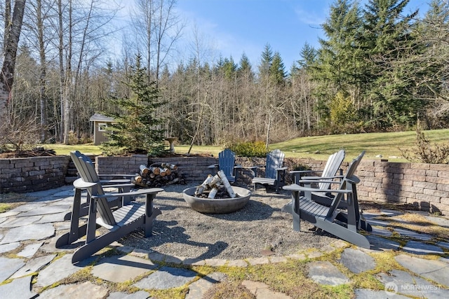 view of patio featuring a fire pit