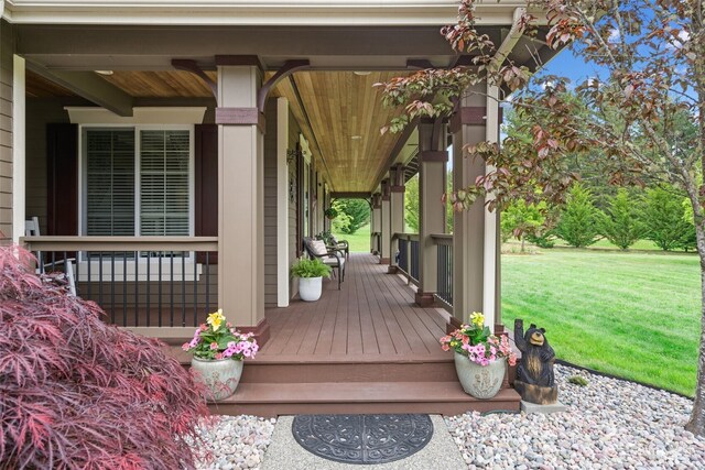 17341 Citori Pl NW, Poulsbo, WA 98370 - wooden deck featuring a porch and a yard