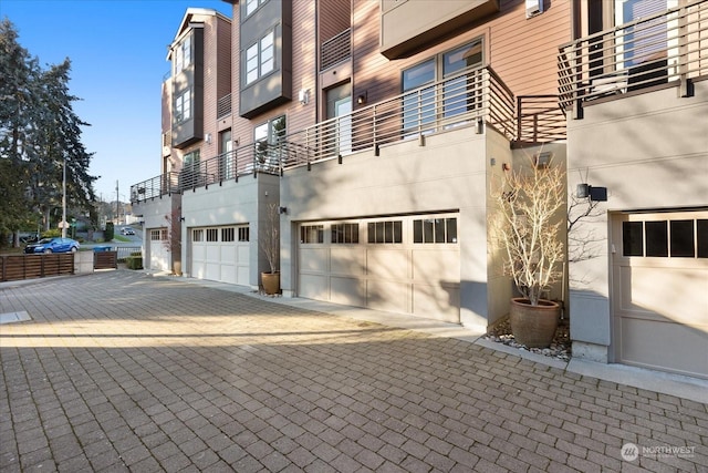 view of building exterior featuring a garage