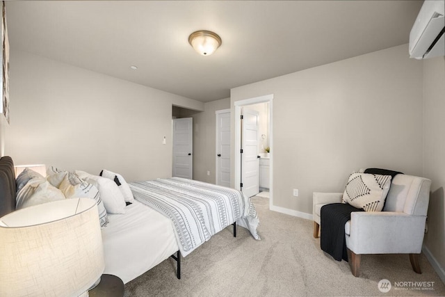 bedroom featuring baseboards, a wall unit AC, and light carpet