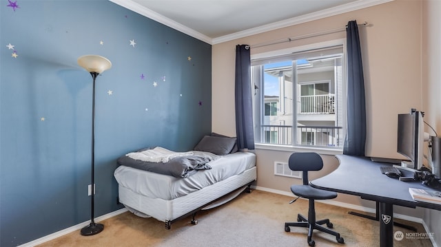 bedroom featuring ornamental molding and carpet flooring