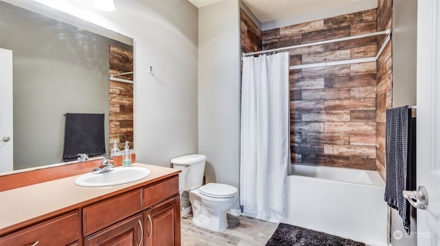 full bathroom with vanity, toilet, and shower / bath combo