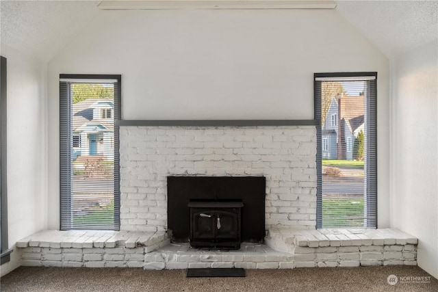 room details featuring carpet floors and a textured ceiling