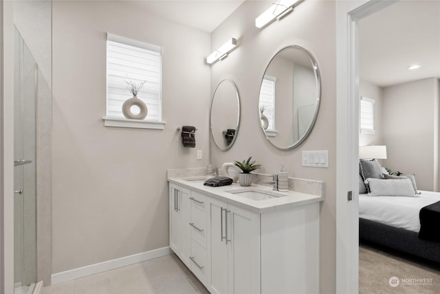 bathroom with vanity and tile patterned flooring