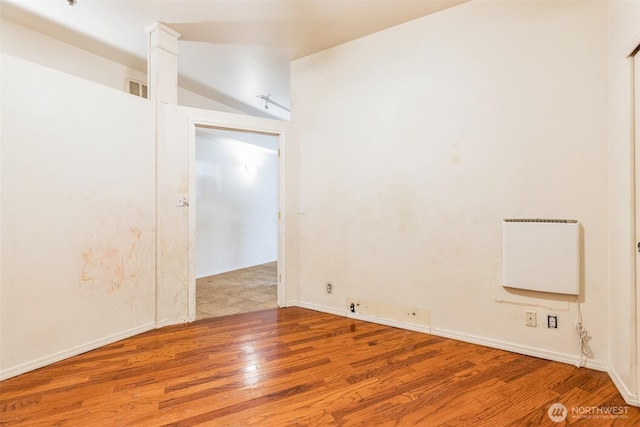 spare room featuring light wood-type flooring