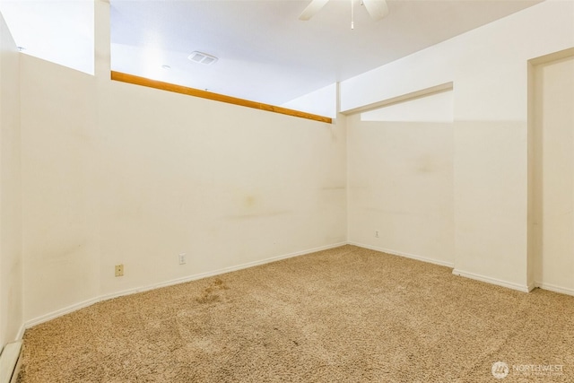 unfurnished room featuring carpet flooring and ceiling fan