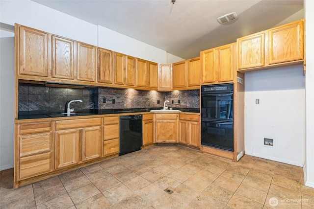 kitchen featuring tasteful backsplash, sink, tile counters, and black appliances