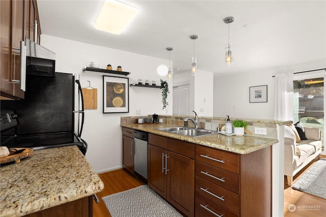 kitchen with electric stove, light stone counters, decorative light fixtures, stainless steel dishwasher, and kitchen peninsula