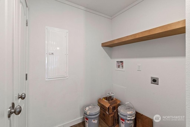 clothes washing area featuring electric dryer hookup, hookup for a washing machine, electric panel, and crown molding