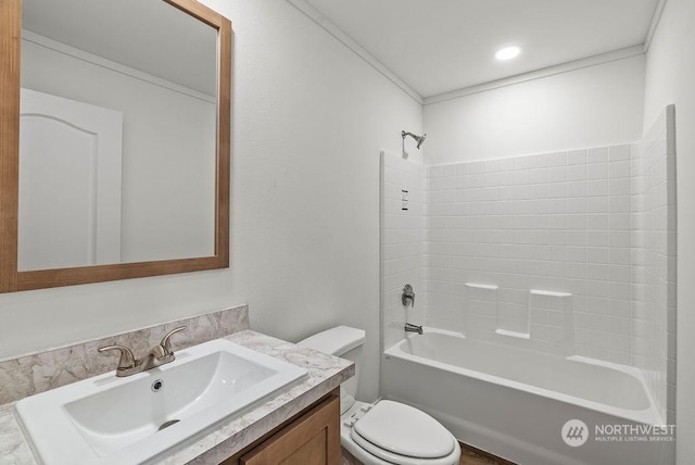 full bathroom with shower / tub combination, vanity, and toilet