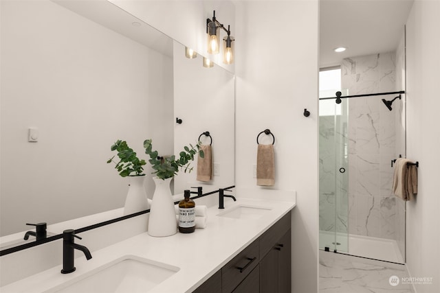 bathroom featuring walk in shower and vanity