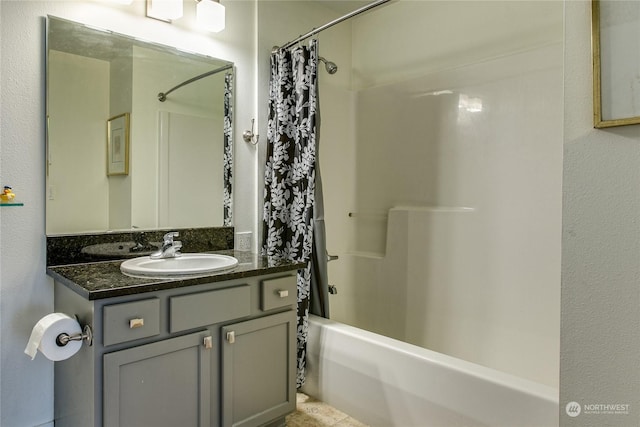 bathroom with vanity and shower / bathtub combination with curtain