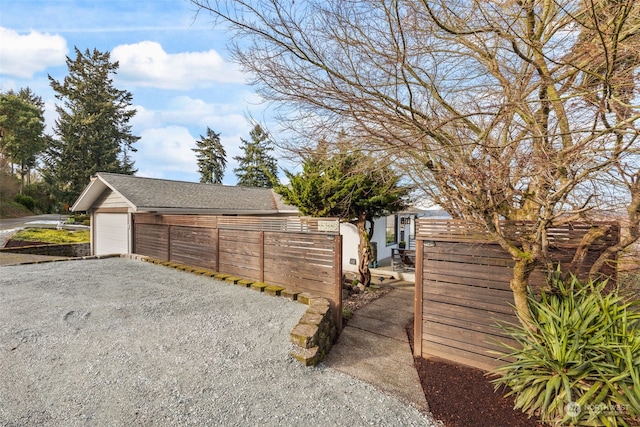 view of yard with a garage