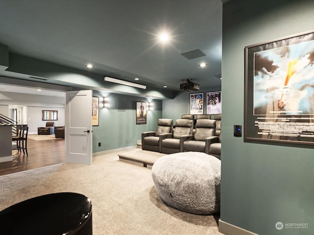 cinema room with carpet, recessed lighting, baseboards, and visible vents