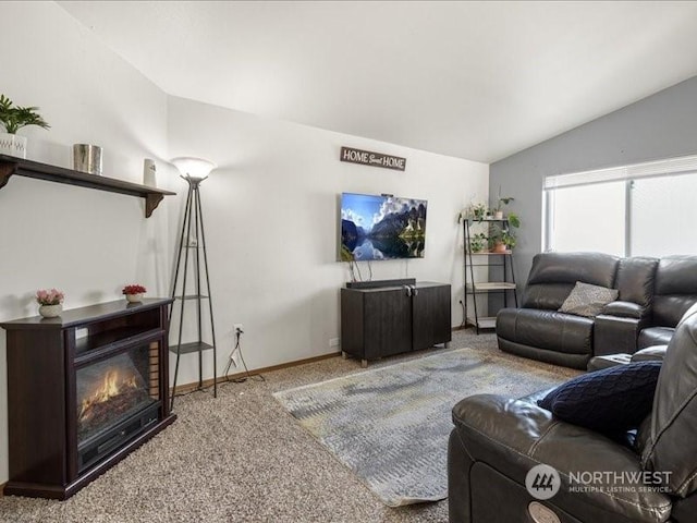 living room featuring lofted ceiling and carpet flooring