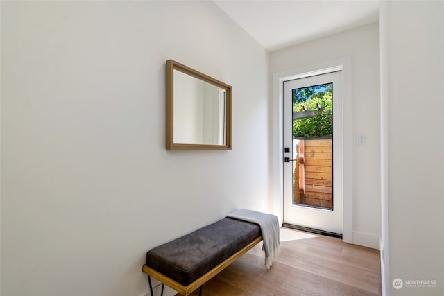 doorway with light wood-type flooring